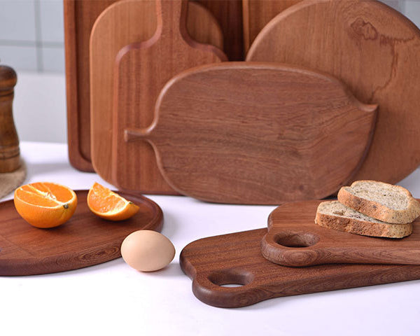 Creative Solid ebony chopping board, wooden kitchen cutting board, multi-functional bread board and serving tray.